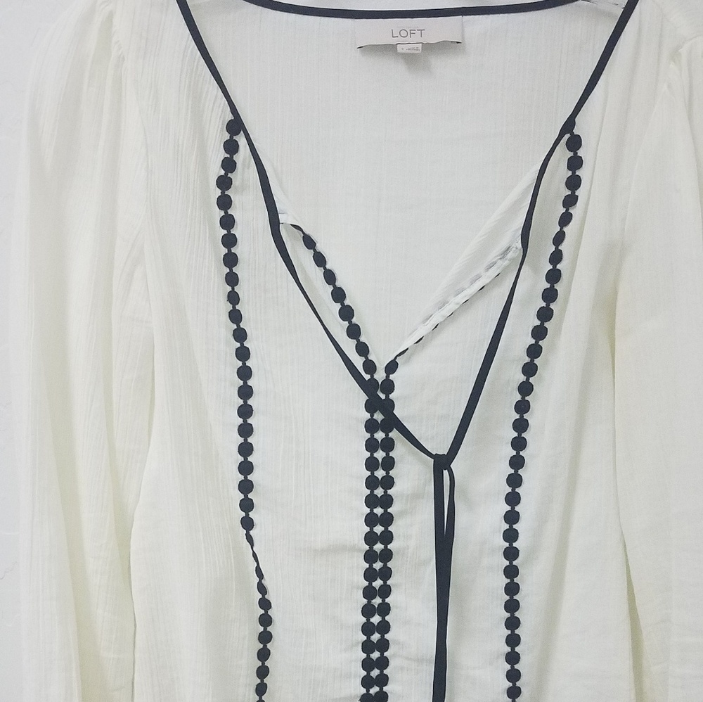 White with black trim  blouse